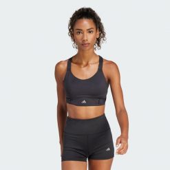 Biustonosz FastImpact Luxe Run High-Support. Czarne obuwie sportowe damskie Adidas, bez wzorów, z materiału, na fitness i siłownię. Za 333.99 zł.