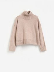Wełniany sweter - beżowy. Brązowe swetry damskie Reserved, l, bez wzorów, z dzianiny, bez kołnierzyka, bez ramiączek, bez kaptura. Za 259.99 zł.