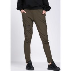 Ciemnozielone Spodnie Dresowe Drama. Zielone spodnie dresowe damskie Born2be, z dresówki. Za 59.99 zł.