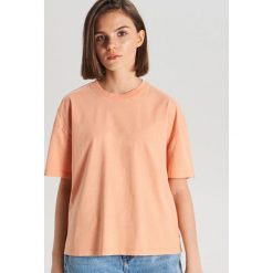 Koszulka oversize - Pomarańczowy. T-shirty damskie marki Cropp. Za 39.99 zł.