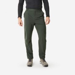 Spodnie turystyczne męskie Quechua SH100 Warm. Zielone spodnie sportowe męskie QUECHUA, na lato, l, bez wzorów, z tkaniny, trekkingowe. Za 129.99 zł.