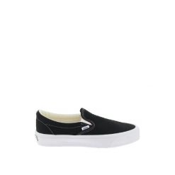 Buty Vans Slip-On Reissue 98 Czarny Płótno. Czarne trampki i tenisówki damskie Vans, bez wzorów, z materiału, eleganckie, bez zapięcia. Za 385.60 zł.