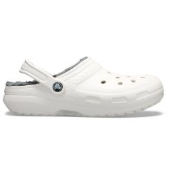 Klapki Crocs Model Classic Lined Clog Kolor Biały. Białe klapki damskie Crocs, bez wzorów, z gumy, bez obcasa. W wyprzedaży za 175.47 zł.