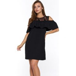 Sukienka w kolorze czarnym. Sukienki damskie marki Bessa, Moonlight. W wyprzedaży za 119.95 zł.