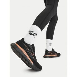 Buty na siłownię Reebok. Czarne obuwie sportowe damskie Reebok, bez wzorów, na fitness i siłownię. Za 399.99 zł.