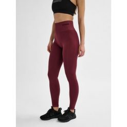 Damskie legginsy bezszwowe Hummel. Brązowe legginsy damskie Hummel, bez wzorów, z materiału, na fitness i siłownię. Za 163.50 zł.
