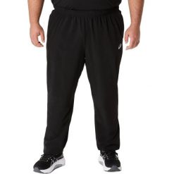 Spodnie dresowe Asics Core woven. Czarne spodnie sportowe męskie Asics, s, bez wzorów, z dresówki, do biegania. Za 253.85 zł.