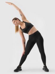 4F Legginsy treningowe z materiału z recyklingu damskie - czarne S. Czarne legginsy damskie 4f, l, bez wzorów, z dzianiny, do biegania. W wyprzedaży za 59.99 zł.