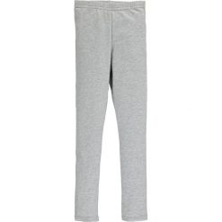 Legginsy w kolorze szarym. Szare legginsy dla dziewczynek Lamino, bez wzorów, z materiału. W wyprzedaży za 35.95 zł.