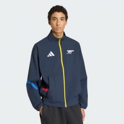 Arsenal FC Z.N.E. Bluza reprezentacyjna. Niebieskie bluzy męskie Adidas, l, bez wzorów, z dresówki, bez kaptura, do piłki nożnej. Za 479.00 zł.