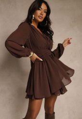 Brązowa Siateczkowa Sukienka o Rozkloszowanym Kroju z Dekoltem w Serek Zennela. Brązowe sukienki damskie Renee, na co dzień, l, bez wzorów, z jeansu, eleganckie, bez kołnierzyka, bez ramiączek, mini, kopertowe. Za 159.99 zł.