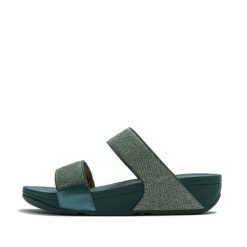 Damskie sandały na koturnie FitFlop Lulu Shimmerglitz. Niebieskie klapki damskie FIT FLOP, bez wzorów, bez obcasa, na koturnie. Za 464.00 zł.