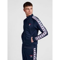 Bluza dresowa zapinana na zamek błyskawiczny Hummel IC Lerby Poly. Niebieskie bluzy sportowe męskie Hummel, m, bez wzorów, z dresówki, bez kaptura. Za 284.00 zł.
