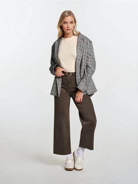 Koszulka w prążki - kremowy. Białe t-shirty damskie Sinsay, l, bez wzorów, prążkowane, bez kołnierzyka. Za 19.99 zł.