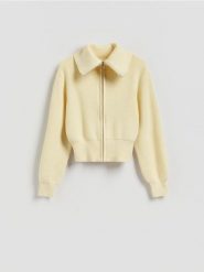 Kardigan z zapięciem na zamek - jasnożółty. Żółte kardigany damskie Reserved, l, bez wzorów, z dzianiny. Za 139.99 zł.