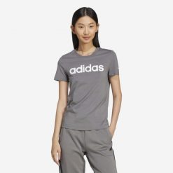 Koszulka damska ADIDAS Gym & Pilates. Szare koszulki sportowe damskie Adidas, s, bez wzorów, z bawełny, bez kołnierzyka, bez ramiączek, na fitness i siłownię. Za 69.99 zł.