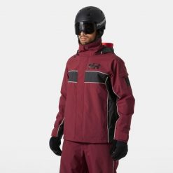 Kurtka narciarska Helly Hansen ULLR D 2.0. Czerwone kurtki damskie Helly Hansen, na zimę, bez wzorów, bez kaptura. W wyprzedaży za 1,073.50 zł.