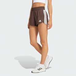 Szorty treningowe Pacer Workout Woven High Rise. Białe szorty sportowe damskie Adidas, bez wzorów, sportowe, na fitness i siłownię, climacool (adidas). Za 149.00 zł.