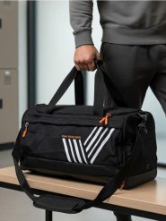 Torba sportowa z odpinanym paskiem - czarny. Czarne torby sportowe męskie Sinsay, bez wzorów, małe. Za 49.99 zł.