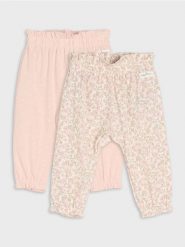 Bawełniane spodnie dresowe bloomers z motywem kwiatowym - kremowy. Białe spodenki niemowlęce Sinsay, bez wzorów, z bawełny. Za 19.99 zł.
