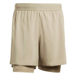 Szorty 2 w 1 adidas Essentials. Brązowe krótkie spodenki sportowe męskie Adidas, l, bez wzorów, do biegania. Za 211.50 zł.
