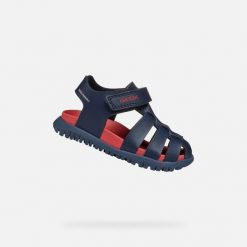 Sandały GEOX B SANDAL FUSBETTO BO Niebieski. Niebieskie sandały męskie Geox, z syntetyku, bez zapięcia. Za 159.99 zł.