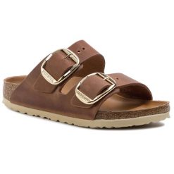 Klapki Birkenstock. Brązowe klapki damskie Birkenstock, bez wzorów, bez obcasa. Za 539.99 zł.