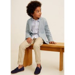 Mango Kids - Spodnie dziecięce Bran 110-164 cm. Spodnie materiałowe dla chłopców Mango Kids, bez wzorów, z bawełny. W wyprzedaży za 39.90 zł.