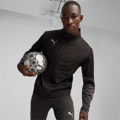 Kurtka Puma Individual Winterized Jacket, Mężczyźni. Czarne kurtki sportowe męskie Puma, m, bez wzorów, z poliesteru, do piłki nożnej. W wyprzedaży za 390.00 zł.
