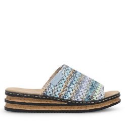 Klapki Rieker. Niebieskie klapki damskie Rieker, bez wzorów, bez obcasa. Za 279.99 zł.