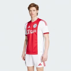 Koszulka Ajax Amsterdam 25/26 Home. Białe koszulki sportowe męskie Adidas, bez wzorów, bez kołnierzyka, bez ramiączek, do piłki nożnej. Za 439.00 zł.