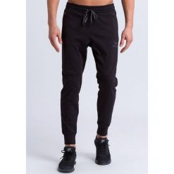 Spodnie dresowe Erima essential. Czarne krótkie spodenki sportowe męskie Erima, m, bez wzorów, z dresówki, na fitness i siłownię. Za 195.00 zł.