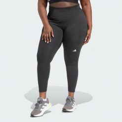 Legginsy Own the Run 7/8 (Plus Size). Czarne legginsy damskie Adidas, plus size, bez wzorów, z materiału, do biegania. Za 279.00 zł.