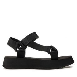 Sandały Calvin Klein Jeans. Czarne sandały damskie Calvin Klein Jeans, bez wzorów, z jeansu, bez obcasa, na płaskiej podeszwie, bez zapięcia. Za 319.99 zł.