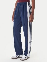 Adidas Spodnie dresowe Adibreak KD6325 Granatowy Loose Fit. Niebieskie spodnie dresowe damskie Adidas, xs, bez wzorów, z dresówki. Za 296.99 zł.