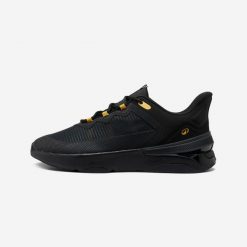 Buty sportowe męskie Domyos Teddy Riner. Czarne buty sportowe męskie DOMYOS, z kauczuku, bez zapięcia, na fitness i siłownię. W wyprzedaży za 199.99 zł.