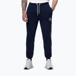 Spodnie męskie Pitbull Nexus Track. Niebieskie spodnie sportowe męskie PITBULL, m, bez wzorów, na fitness i siłownię. Za 239.99 zł.