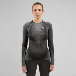 Koszulka termoaktywna z długim rękawem damska Odlo BLACKCOMB ECO. Czarne koszulki sportowe damskie Odlo, xl, bez wzorów, z elastanu, bez kołnierzyka, bez ramiączek, do biegania. Za 359.99 zł.