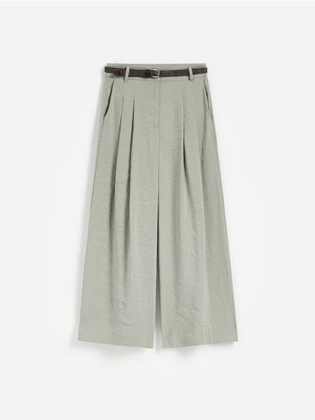 Spodnie z paskiem - jasnozielony. Zielone spodnie materiałowe damskie Reserved, l, bez wzorów, z tkaniny. Za 119.99 zł.
