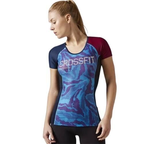 Koszulka treningowa damska Reebok Compression. Niebieskie koszulki sportowe damskie Reebok, l, bez wzorów, z materiału, eleganckie, bez kołnierzyka. Za 308.00 zł.