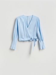 Bluzka z lnem - jasnoniebieski. Niebieskie bluzki damskie Reserved, l, bez wzorów, z wiskozy, bez kołnierzyka, bez ramiączek. Za 119.99 zł.