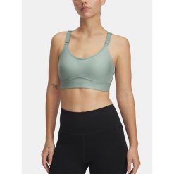 Biustonosz treningowy Under Armour Infinity Mid. Zielone obuwie sportowe damskie Under Armour, bez wzorów, na fitness i siłownię. Za 149.99 zł.