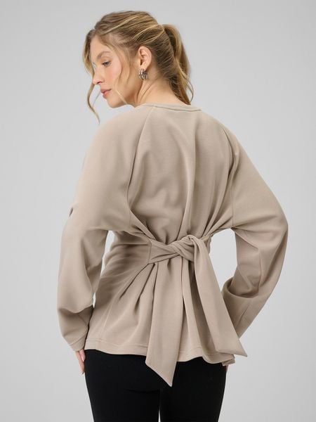 4F Bluza regular z wiązaniem i modalem damska - beżowa XL. Brązowe bluzy damskie 4f, xl, bez wzorów, z dzianiny, bez kołnierzyka, bez ramiączek, bez kaptura. W wyprzedaży za 159.99 zł.