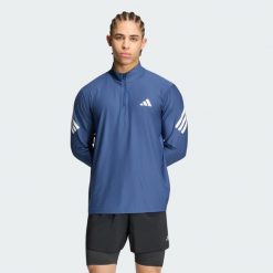 Bluza adi365 Iconic 1/2 Zip. Białe bluzy męskie Adidas, xl, bez wzorów, z dzianiny, bez kaptura. Za 219.00 zł.