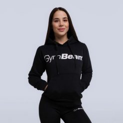 Bluza damska fitness z kapturem czarna Athlete. Czarne bluzy damskie GYMBEAM, xs, bez wzorów, z bawełny, z kapturem, na fitness i siłownię. Za 85.90 zł.