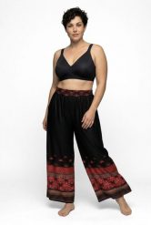 Damskie Spodnie palazzo obszycie szeroka nogawka elastyczny pas. Czarne spodnie materiałowe damskie Ulla Popken, plus size, bez wzorów, z materiału. Za 239.99 zł.