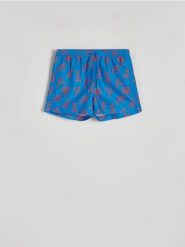 Wzorzyste szorty plażowe - niebieski. Niebieskie szorty męskie Reserved, l, bez wzorów, z tkaniny. W wyprzedaży za 39.99 zł.