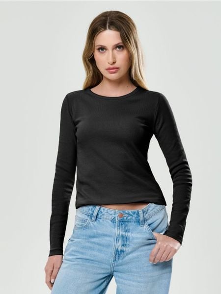 Prążkowana koszulka z długim rękawem - czarny. Czarne t-shirty damskie Sinsay, l, bez wzorów, prążkowane, bez kołnierzyka. Za 19.99 zł.
