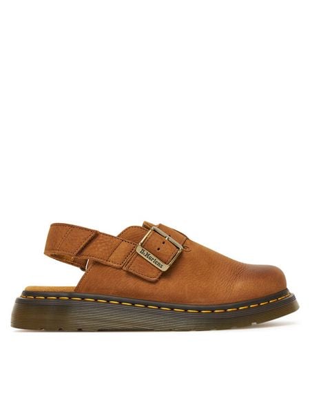 Dr. Martens Sandały Jorge II Mule DM31568200 Brązowy. Brązowe sandały damskie Dr. Martens, bez wzorów, z nubiku, bez obcasa, na płaskiej podeszwie, bez zapięcia. Za 479.99 zł.