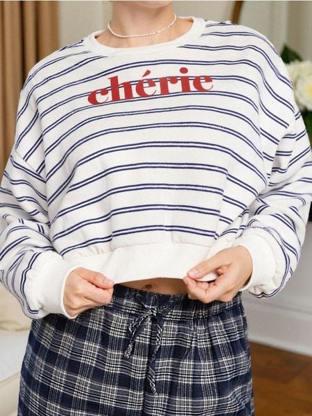 Bluza w paski z napisem - wielobarwny. Bluzy damskie Sinsay, l, bez wzorów, bez kaptura. Za 39.99 zł.